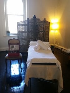photo of a massage table in a clinic