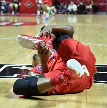 basketball player falling with ankle injury